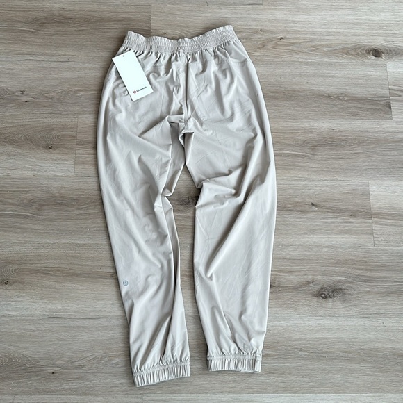 Lululemon Tear-Away Mid-Rise Track Pant Color Mojave Tan - Picture 12 of 12